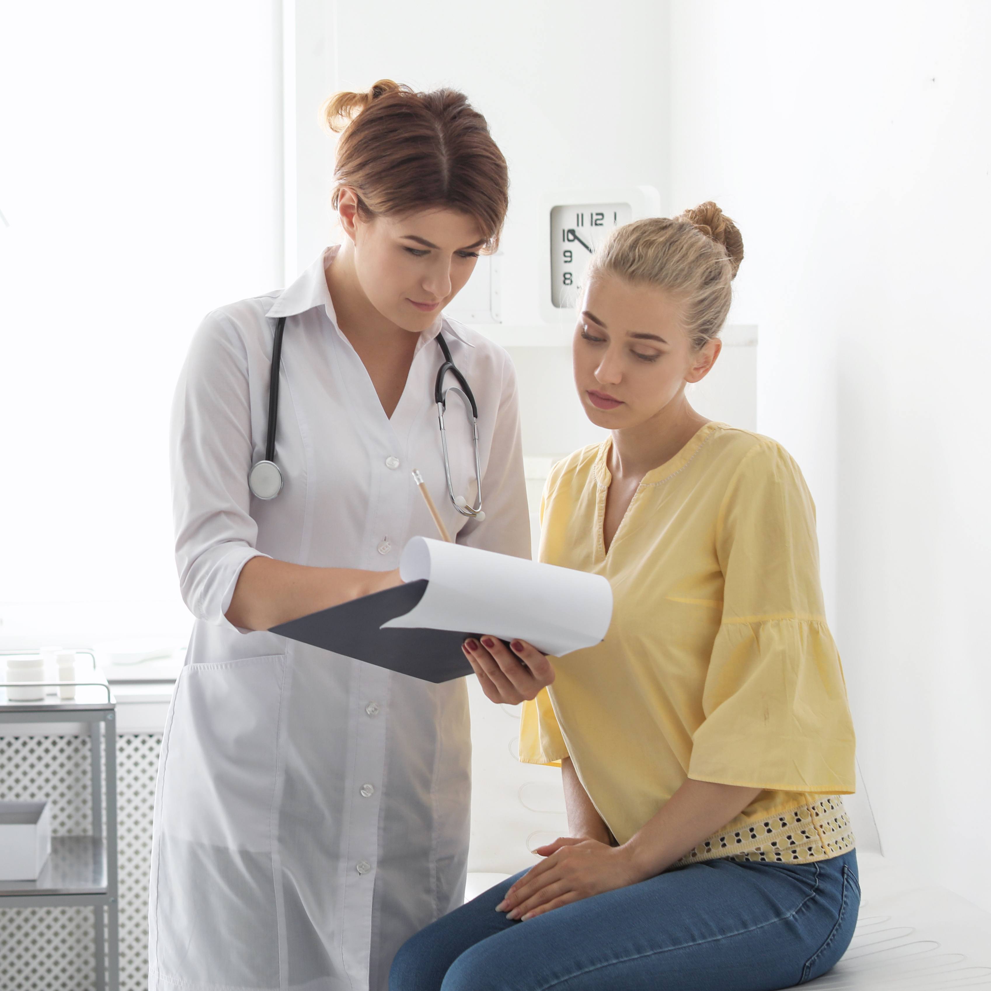 Patient having appointment with doctor in hospital