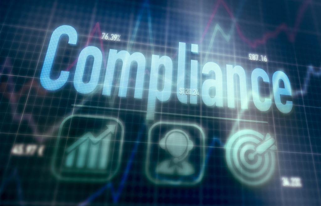 Compliance concept on a blue dot matrix computer display.